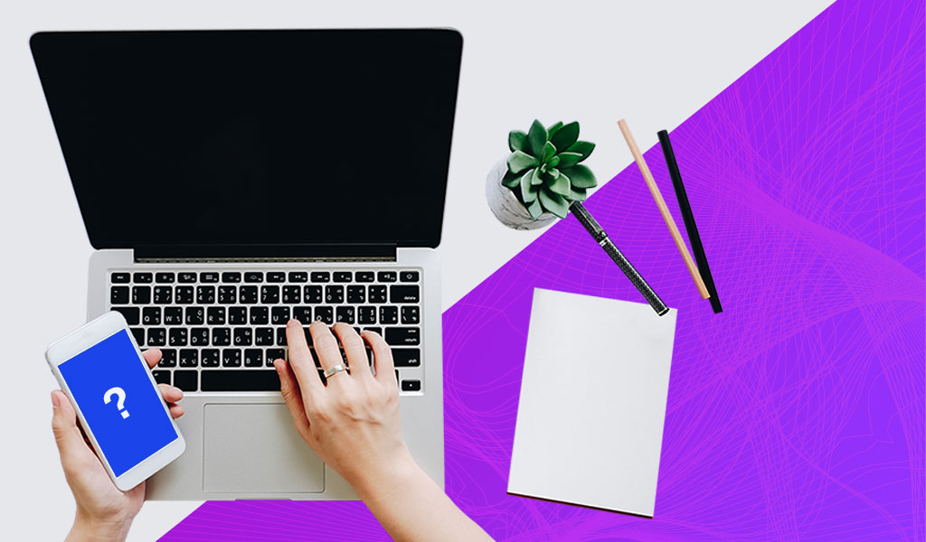 Laptop and phone on desk